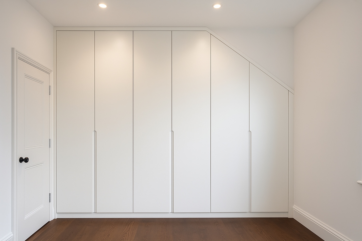 Built-in wardrobe for sloping ceiling in London