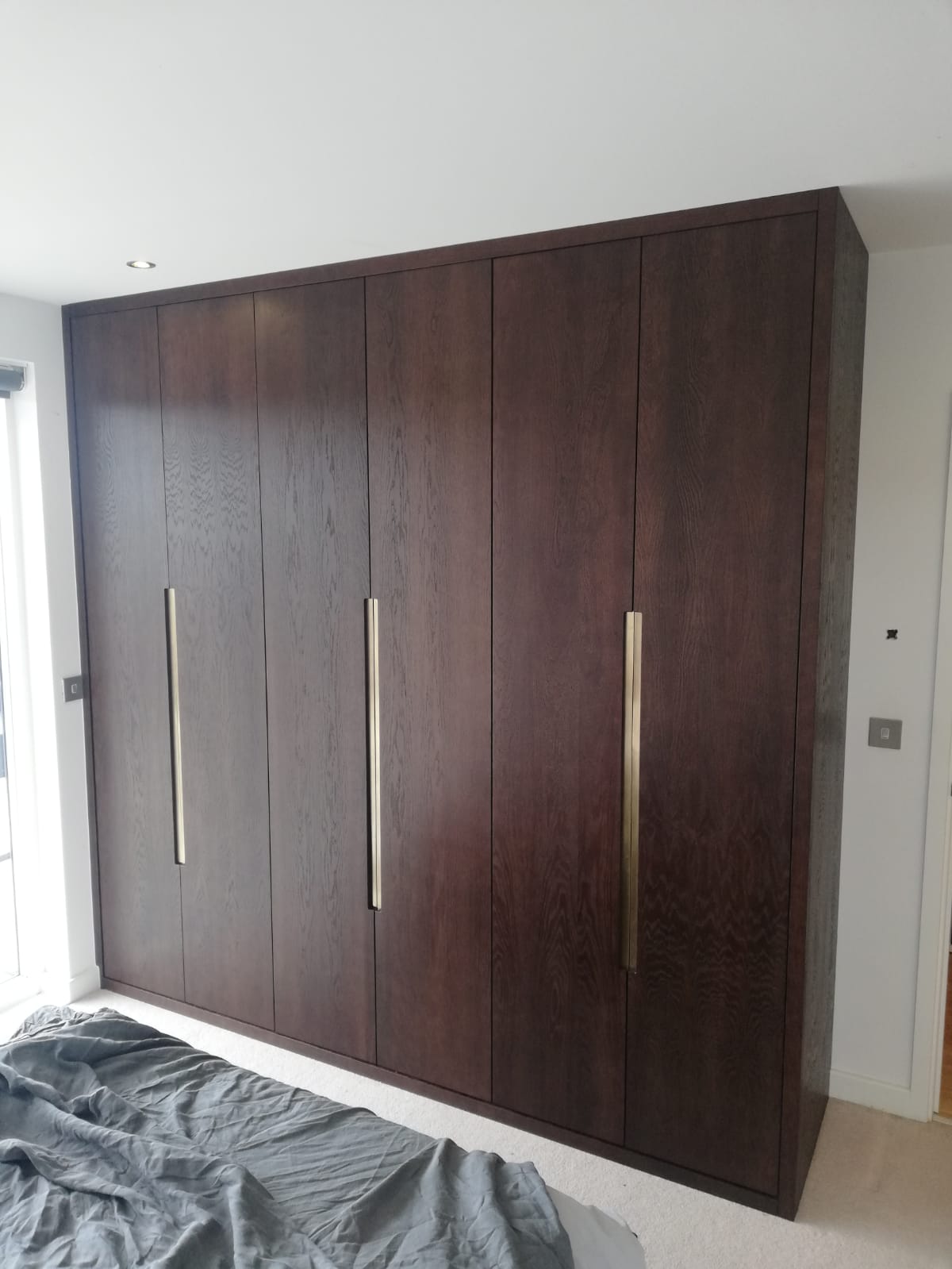 Antico real wood veneer doors with metal handles, London bespoke wardrobes