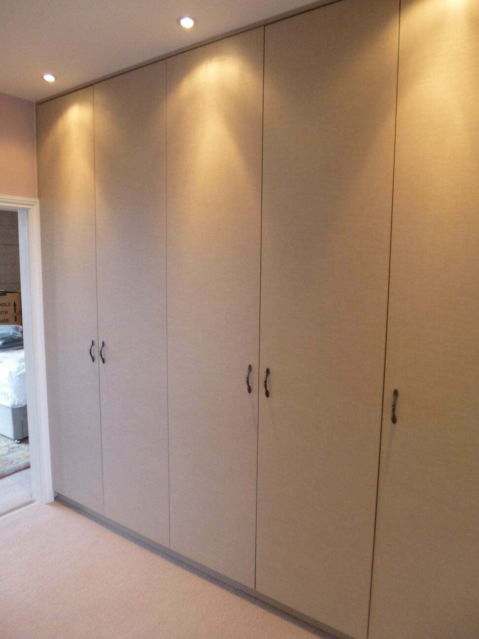 Fabrics walk in wardrobe made to measure London