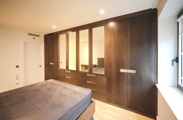 Bespoke real wood fitted wardrobes, metal handles, Canary Wharf