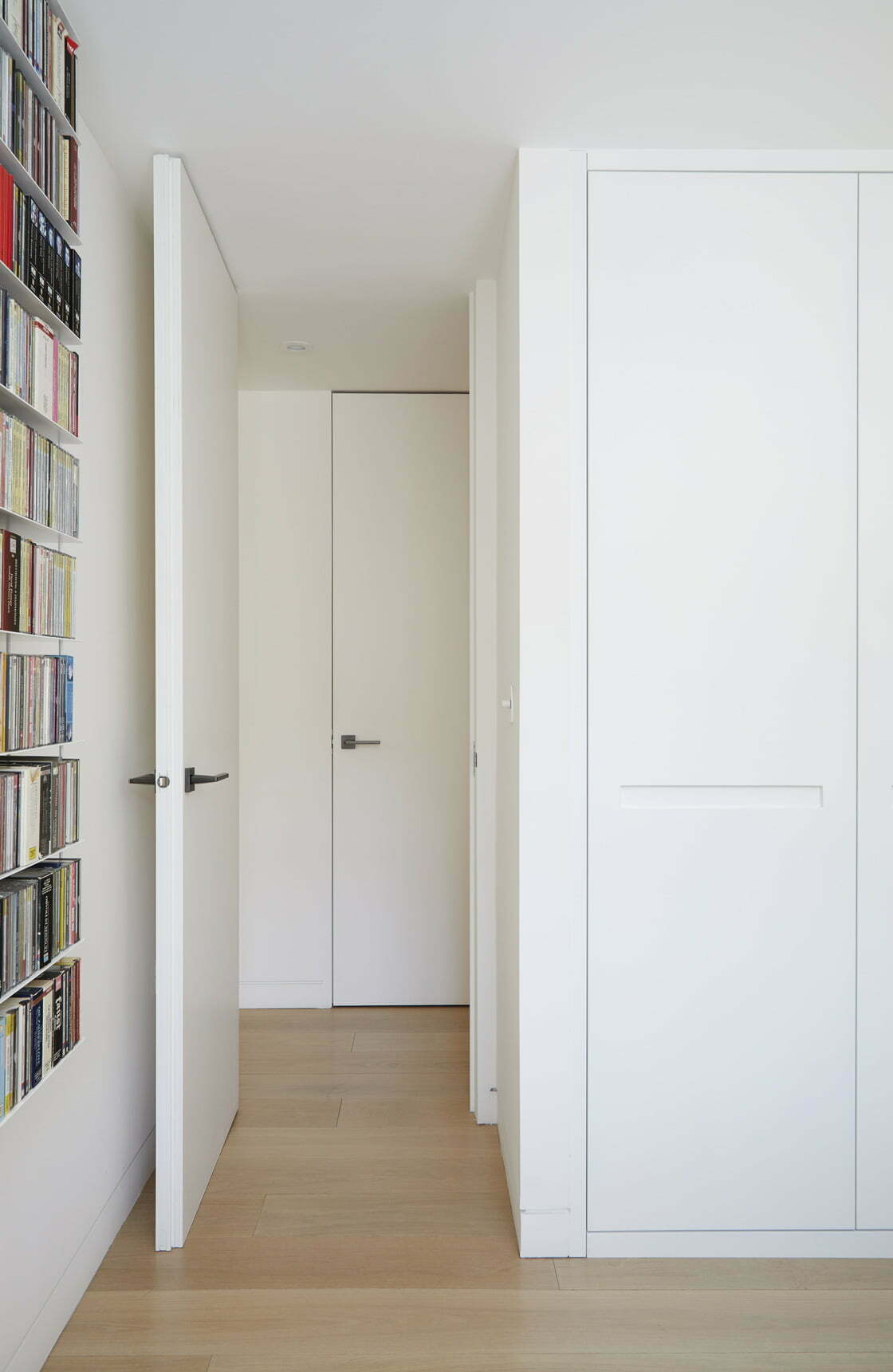 Fully fitted wood veneer wardrobes and TV unit, Westminster, London