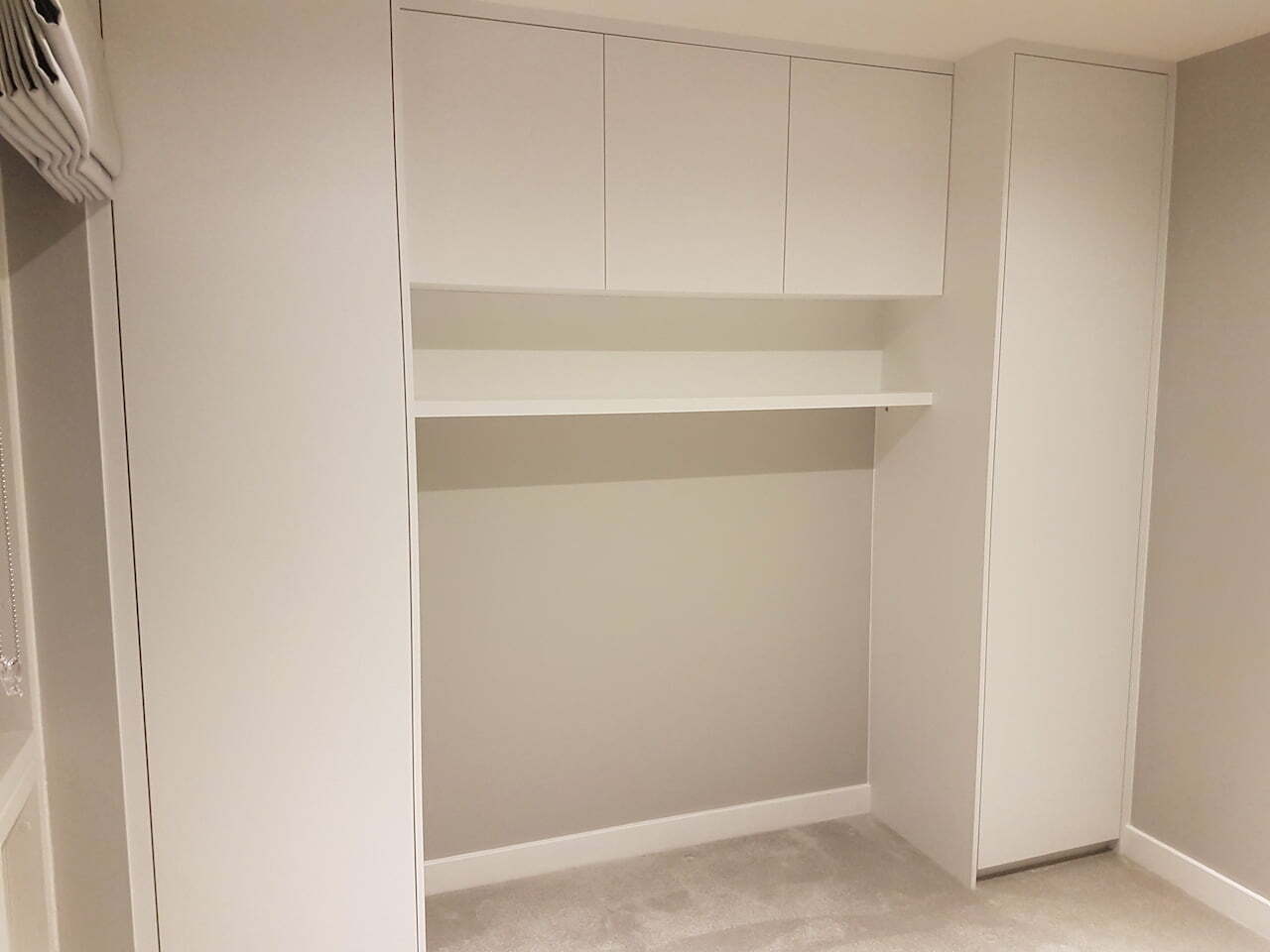 overbed fitted cupboards london