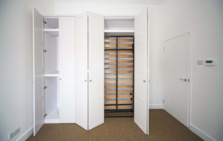 Shaker wardrobe with pull down bed mechanism