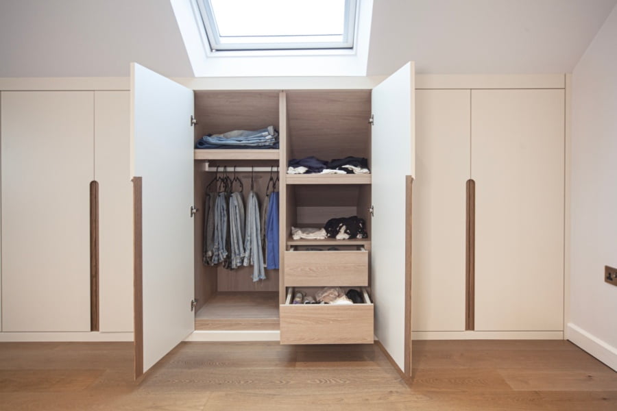 Fitted Scandinaviat style wardrobes in eaves, built in Nordic
